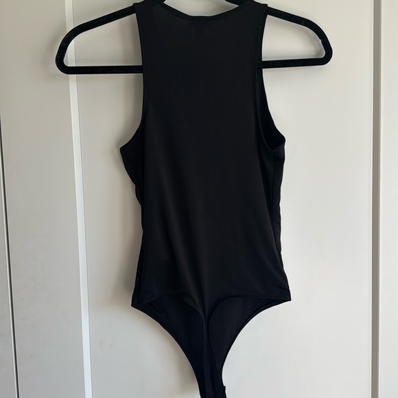NWT Express Body Contour Compression High Neck
Bodysuit - size XS - black - Picture 8 of 12